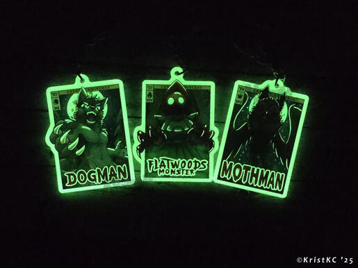 Cryptid Keychains glowing